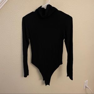 Black turtleneck bodysuit